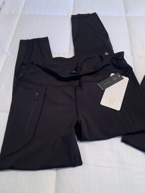 Lululemon Luxtreme* Invigorate 7/8
Tight -Black Size 12 - 25” Inseam NWT
